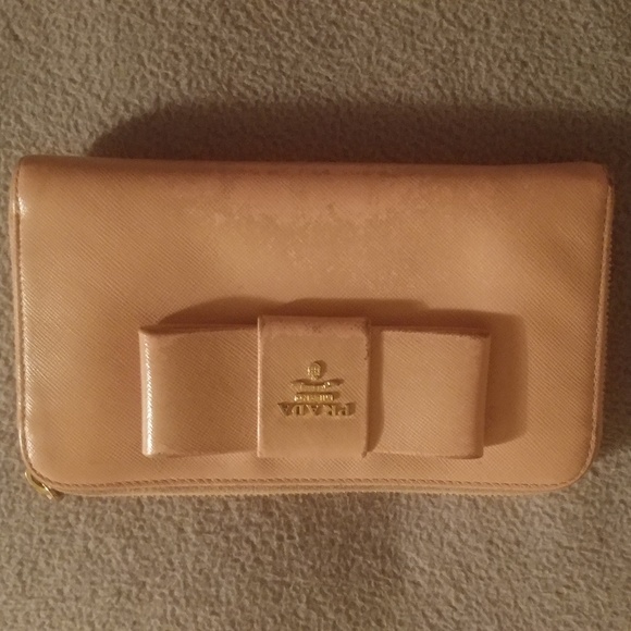Prada Handbags - Prada pink gold leather bow zip around wallet